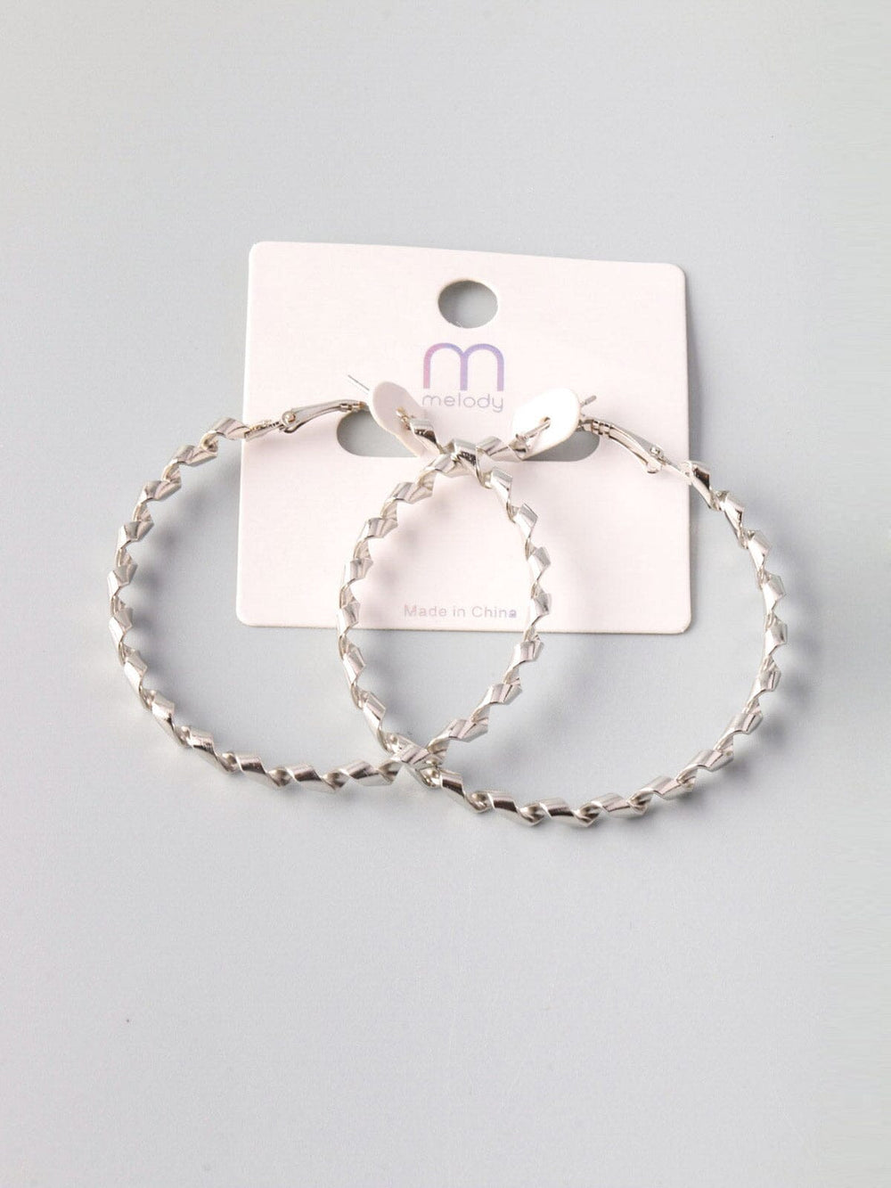 WOMEN'S SILVER TWIST HOOP EARRINGS