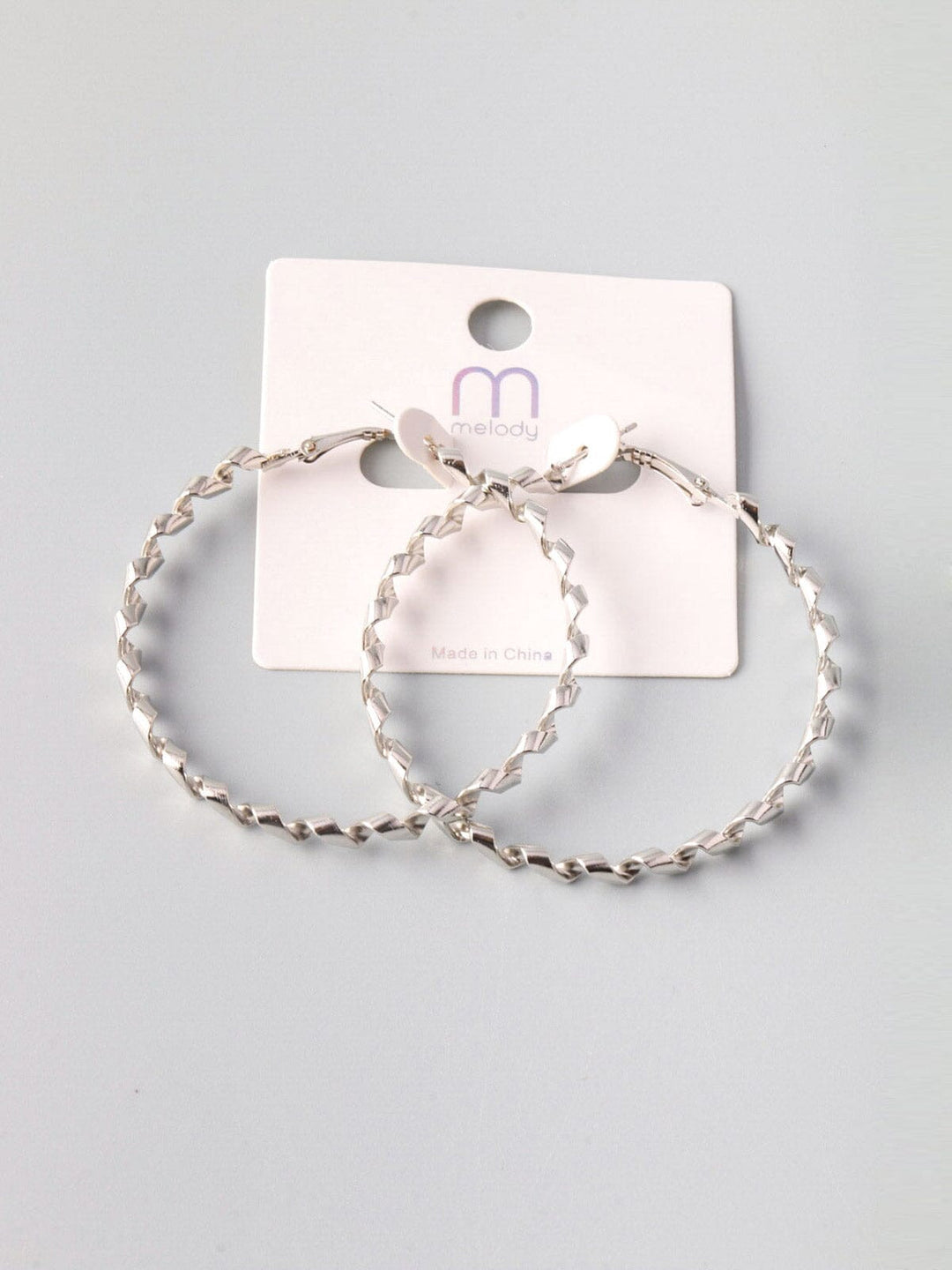 WOMEN'S SILVER TWIST HOOP EARRINGS