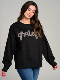 WOMEN'S LONG SLEEVE GRAPHIC PULLOVER SWEATER