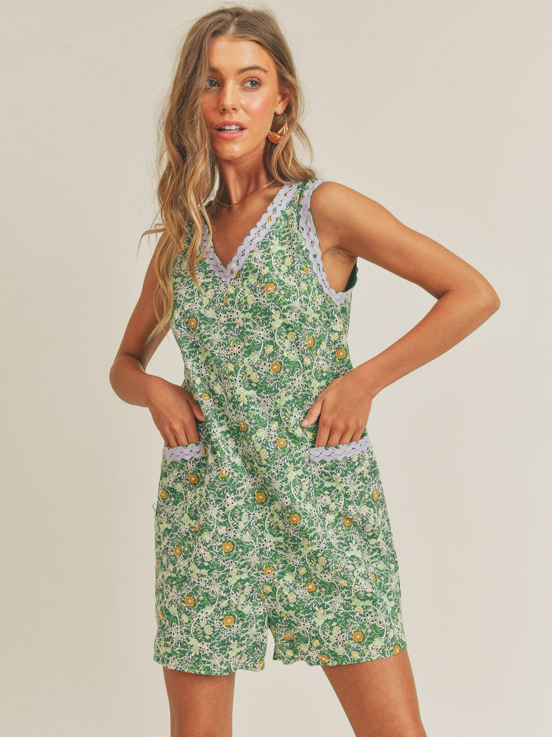 JUST ME WOMEN'S SLEEVELESS V-NECK EYELET FLORAL ROMPER