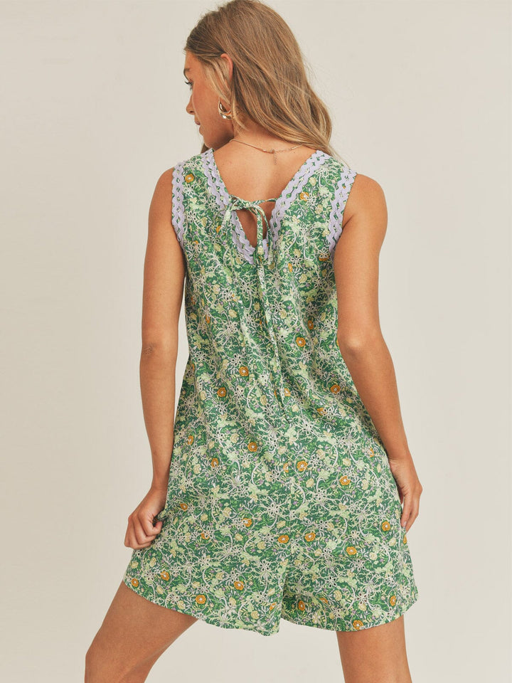 JUST ME WOMEN'S SLEEVELESS V-NECK EYELET FLORAL ROMPER