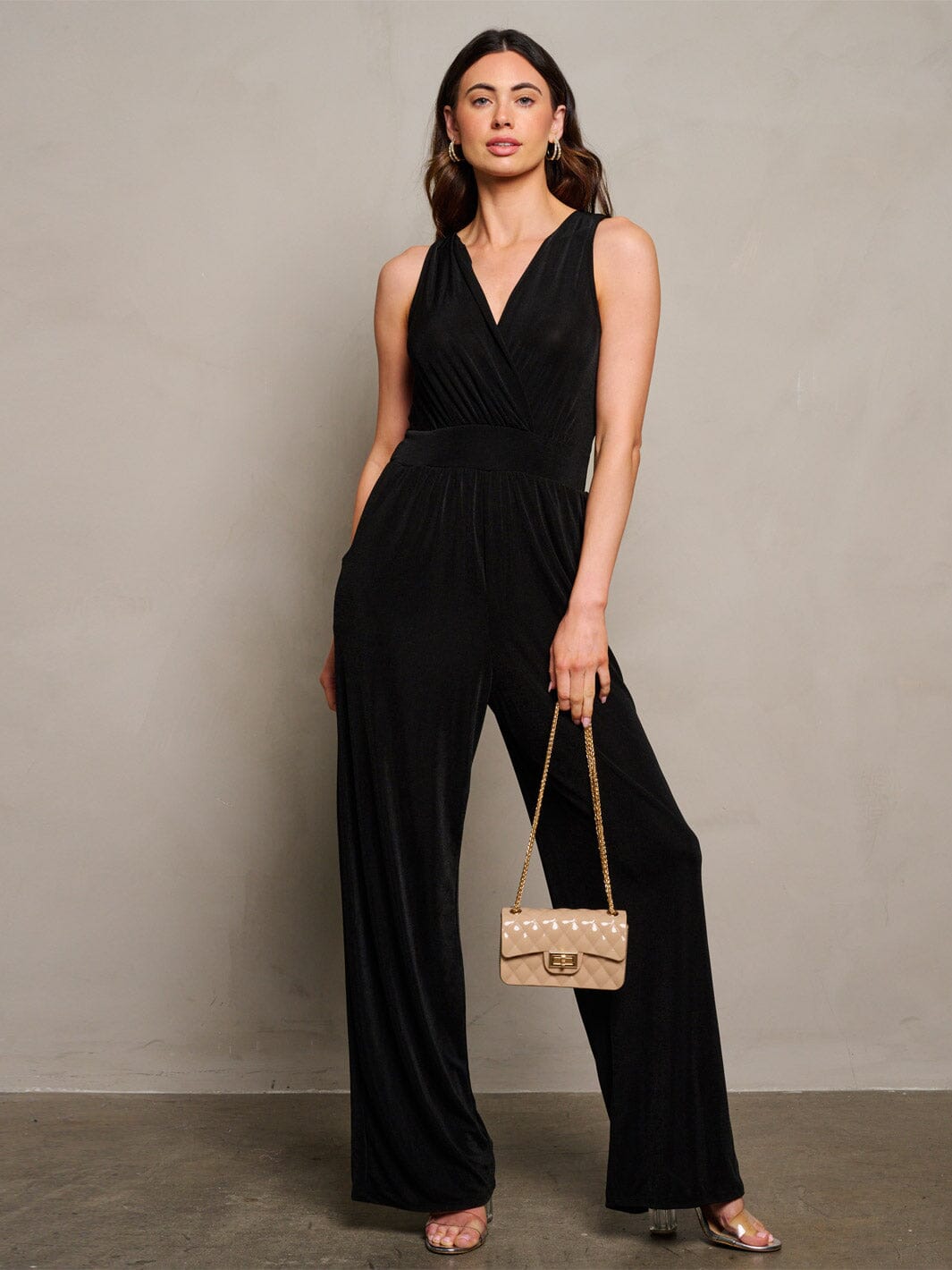 WOMEN'S SLEEVELESS SURPLICE POCKETS SHIMMER WIDE LEG JUMPSUIT
