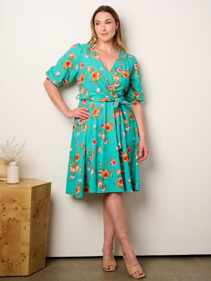 PLUS SIZE SHORT SLEEVE SURPLICE FIT & FLARE FLORAL MIDI DRESS