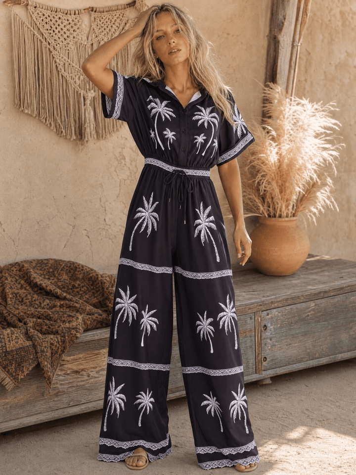 WOMEN'S SHORT SLEEVE BUTTON UP ELASTIC WAIST POCKETS WIDE LEG MULTI PRINT JUMPSUIT