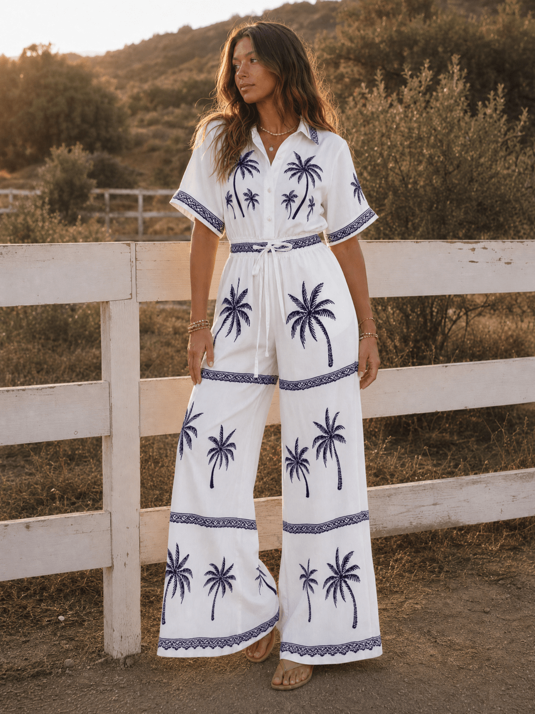 WOMEN'S SHORT SLEEVE BUTTON UP ELASTIC WAIST POCKETS WIDE LEG MULTI PRINT JUMPSUIT