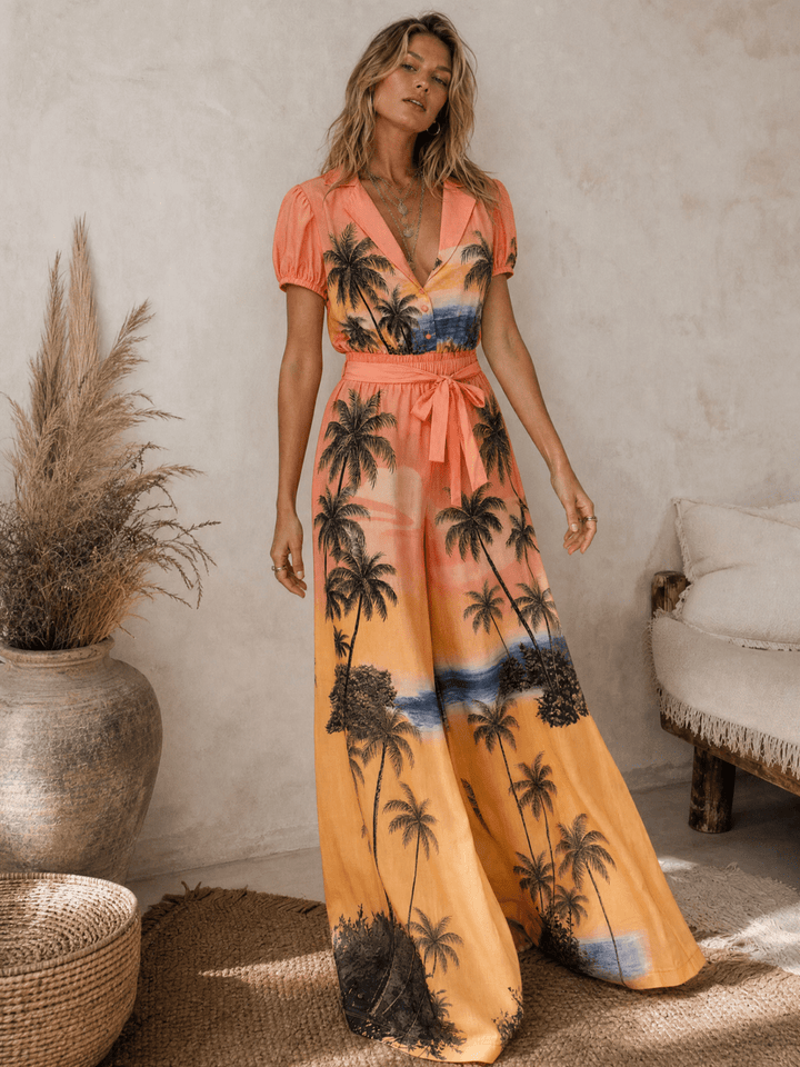 WOMEN'S SHORT SLEEVE BUTTON UP SELF TIE ELASTIC WAIST WIDE LEG MULTI PRINT JUMPSUIT