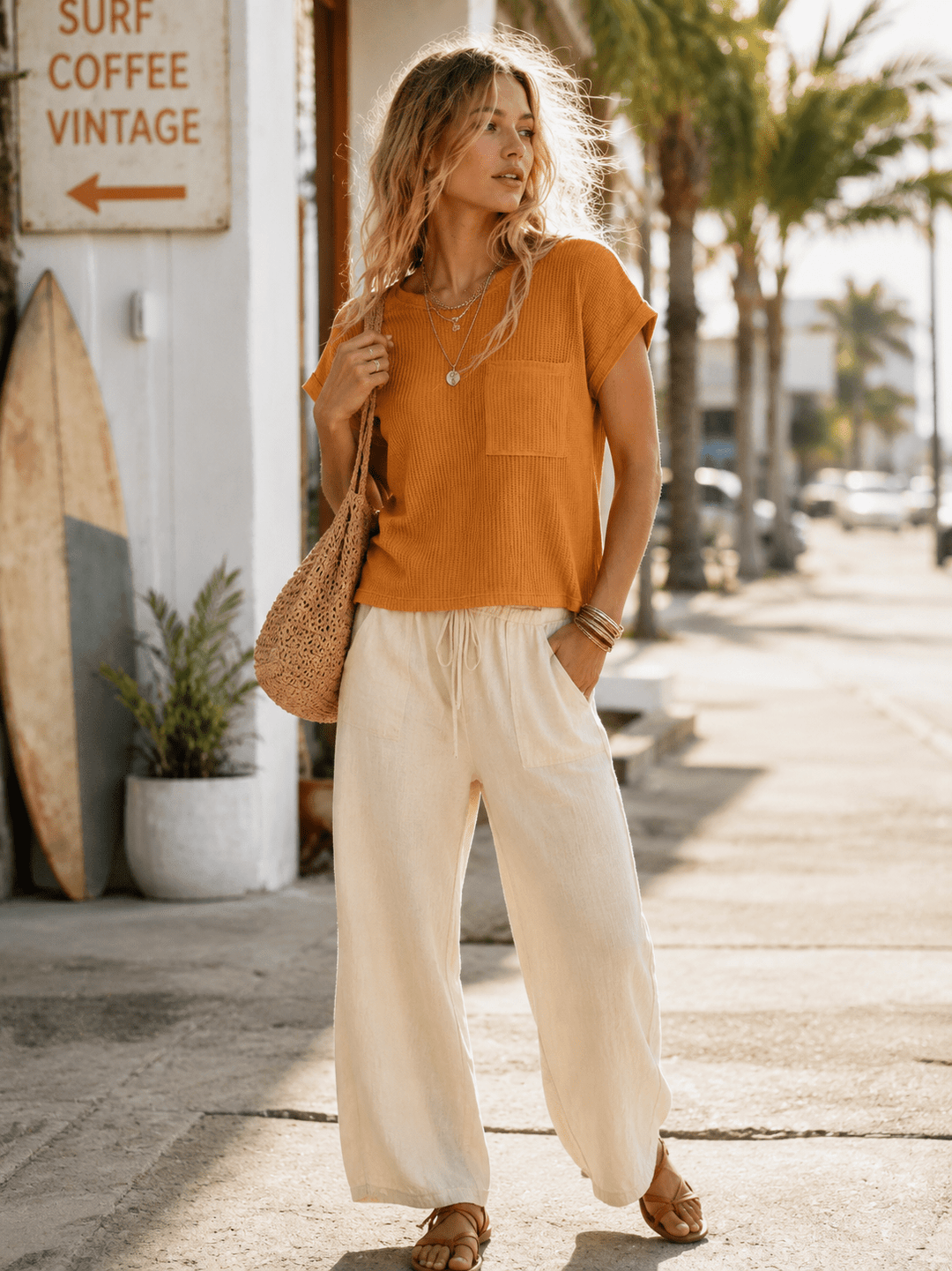 WOMEN'S SHORT SLEEVE FRONT POCKET RIBBED TOP