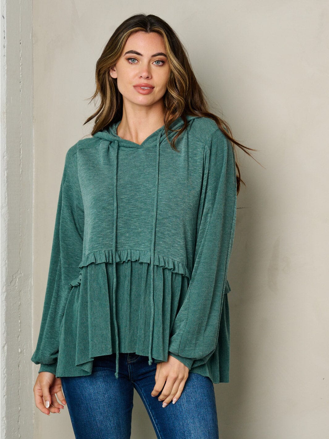 WOMEN'S LONG SLEEVE HOODED RUFFLE BOTTOM HEM TOP