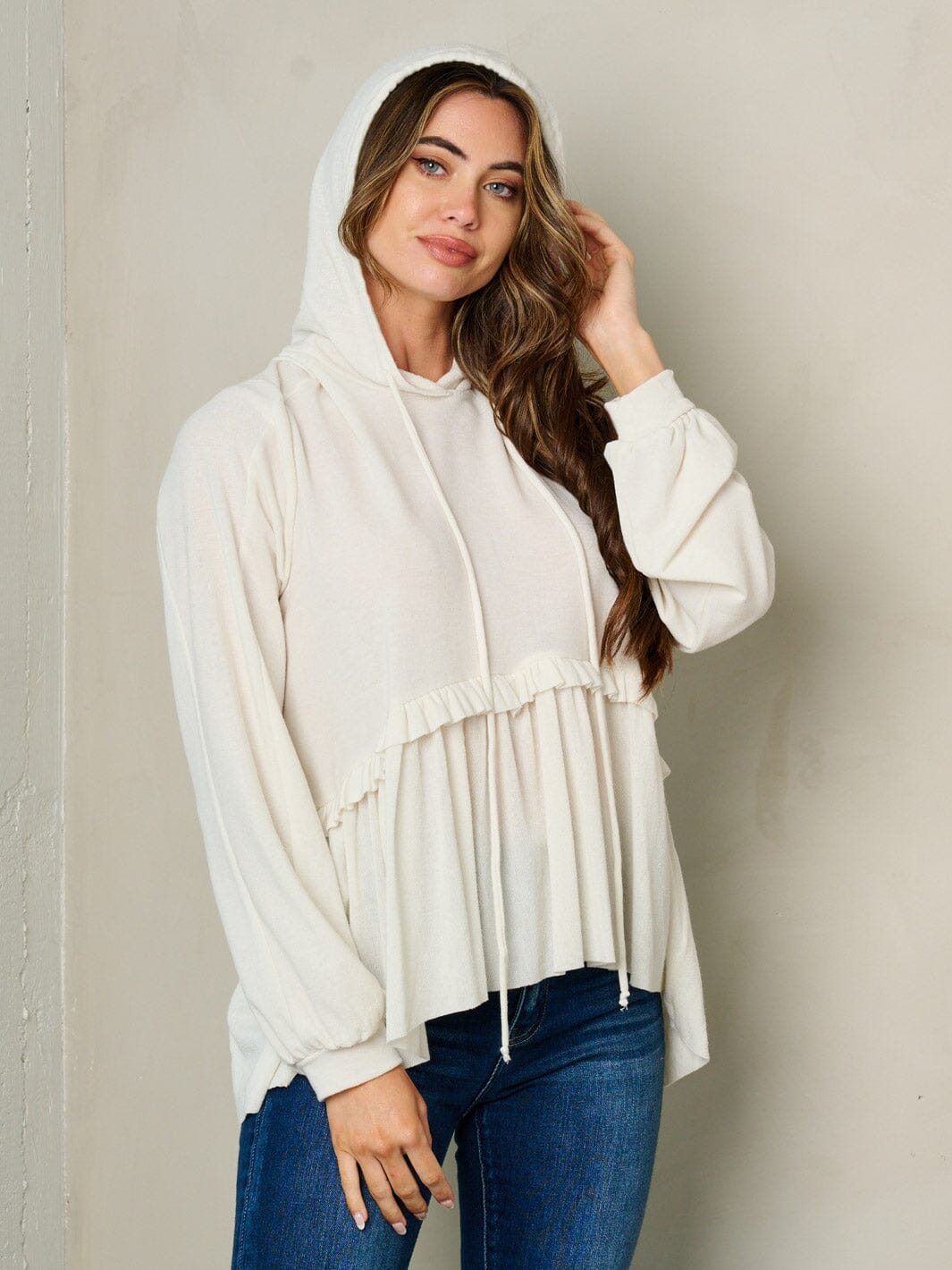 WOMEN'S LONG SLEEVE HOODED RUFFLE BOTTOM HEM TOP