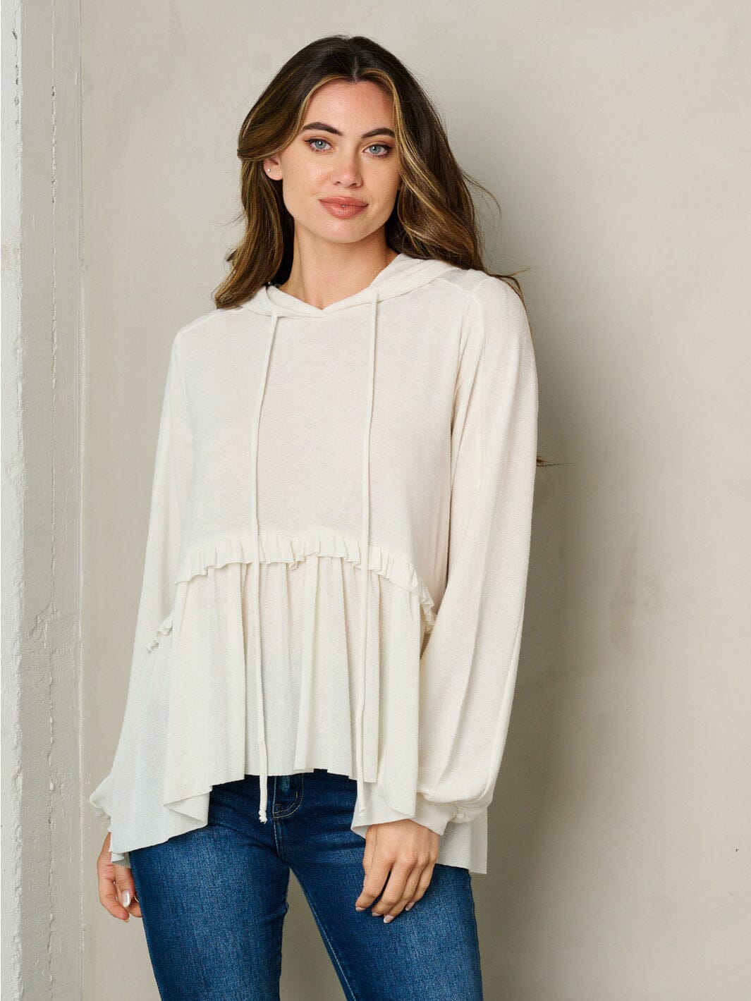 WOMEN'S LONG SLEEVE HOODED RUFFLE BOTTOM HEM TOP