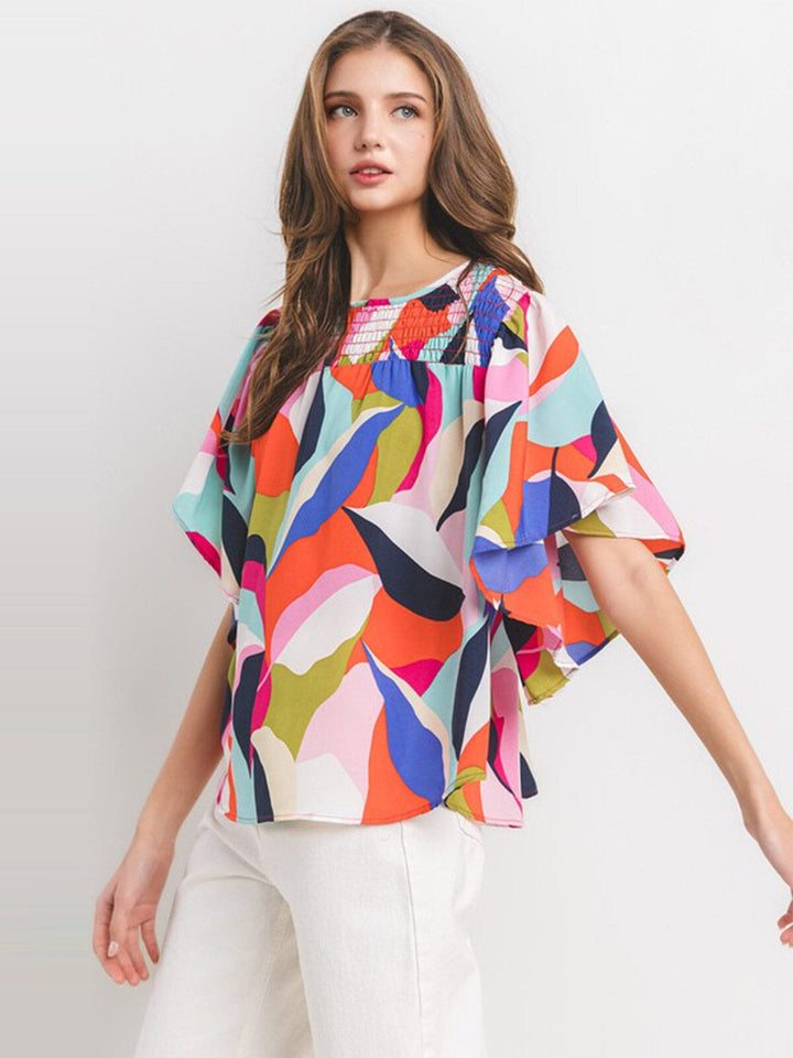 WOMEN'S SHORT RUFFLE SLEEVE MULTI PRINT BLOUSE