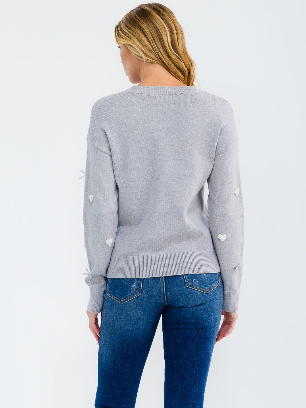 WOMEN'S LONG SLEEVE HEART & BOWS DETAILED PULLOVER SWEATER