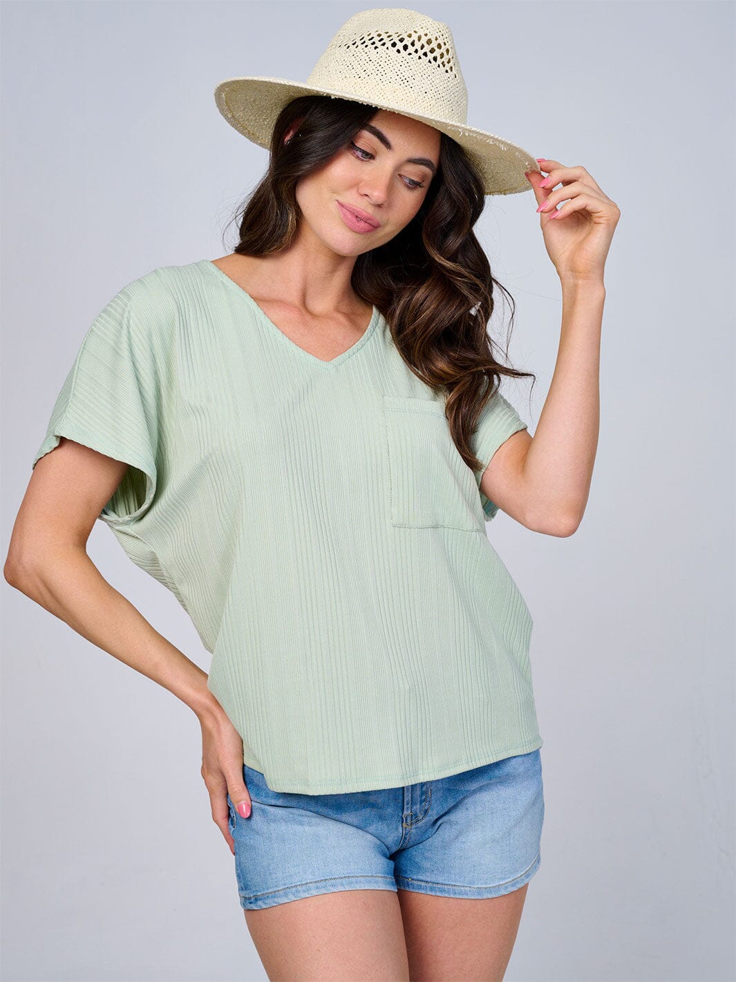 WOMEN'S SHORT SLEEVES V-NECK HIGH-LOW FRONT POCKET RIBBED BLOUSE