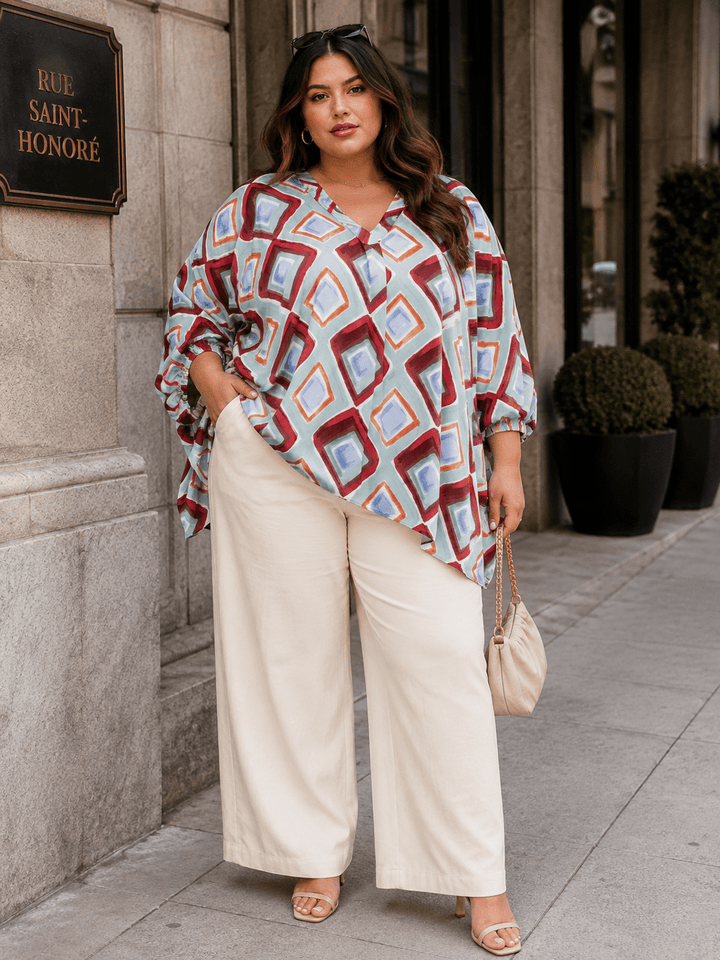 PLUS SIZE SHORT SLEEVE V-NECK MULTI PRINT TUNIC BLOUSE