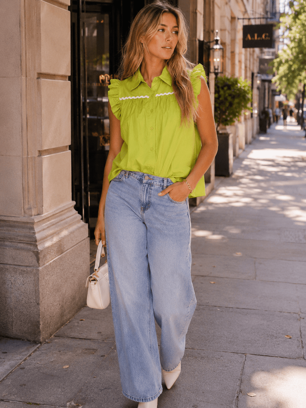 WOMEN'S SLEEVELESS RUFFLE BUTTON UP TUNIC TOP