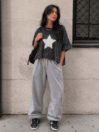 WOMEN'S SHORT SLEEVE STAR PRINT WASHED LOOSE FIT HIGH-LOW SHIRT