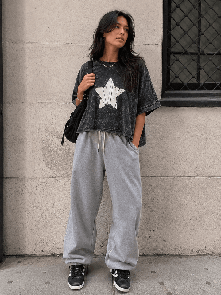 WOMEN'S SHORT SLEEVE STAR PRINT WASHED LOOSE FIT HIGH-LOW SHIRT