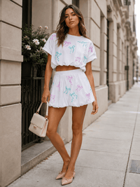 WOMEN'S SHORT SLEEVE SEQUINS BOWS DETAILED BUBBLE BOTTOM HEM TOP