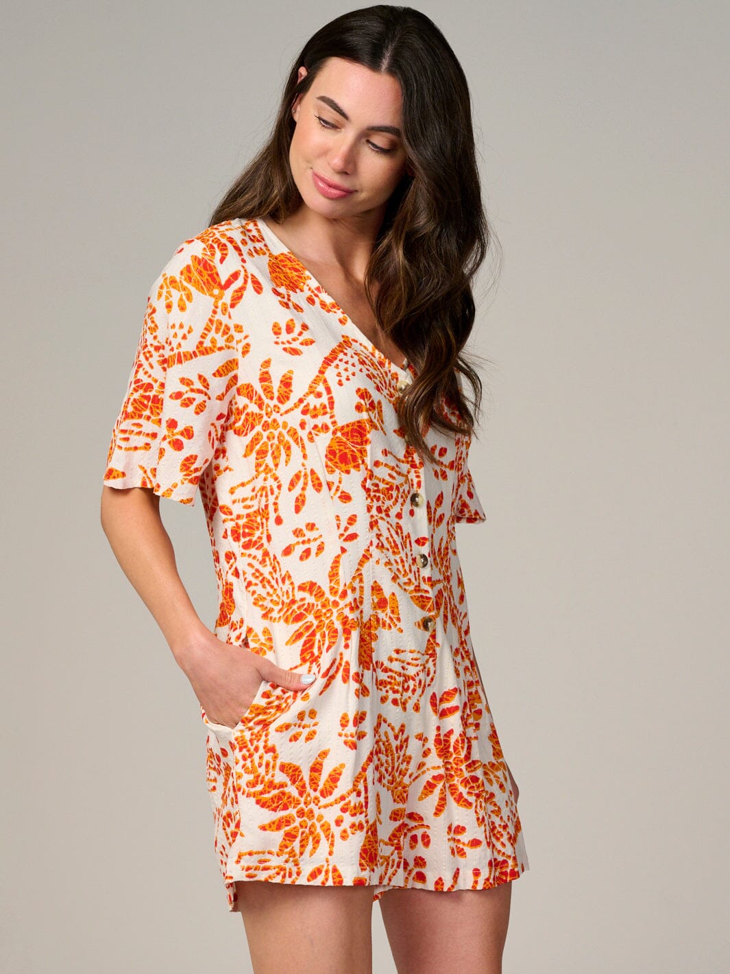 WOMEN'S SHORT SLEEVE BUTTON UP FRONT POCKETS FLORAL ROMPER