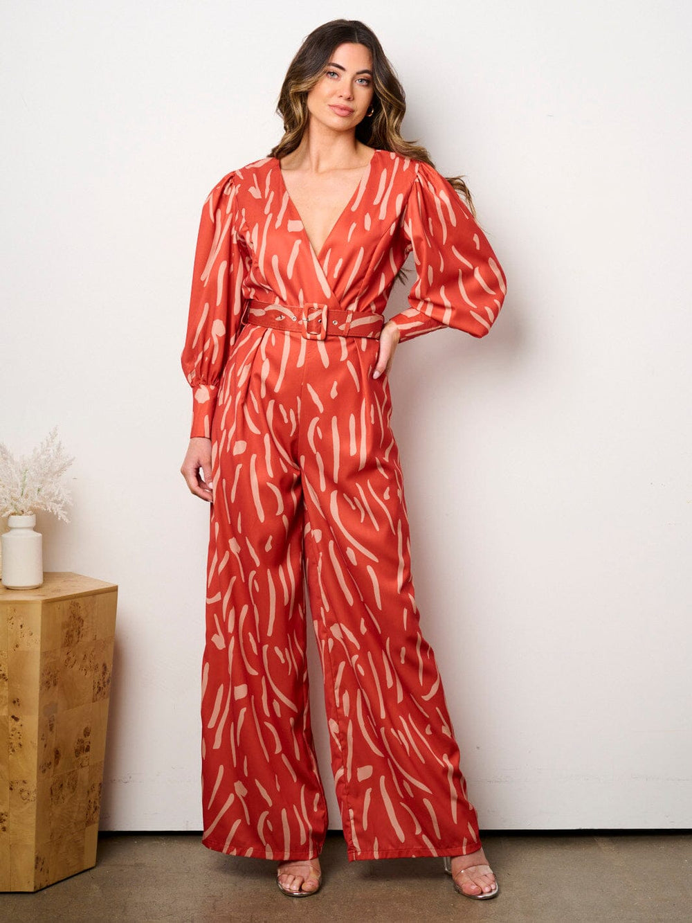 WOMEN'S LONG SLEEVE SURPLICE BELTED PRINT JUMPSUIT