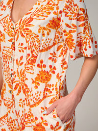 WOMEN'S SHORT SLEEVE BUTTON UP FRONT POCKETS FLORAL ROMPER