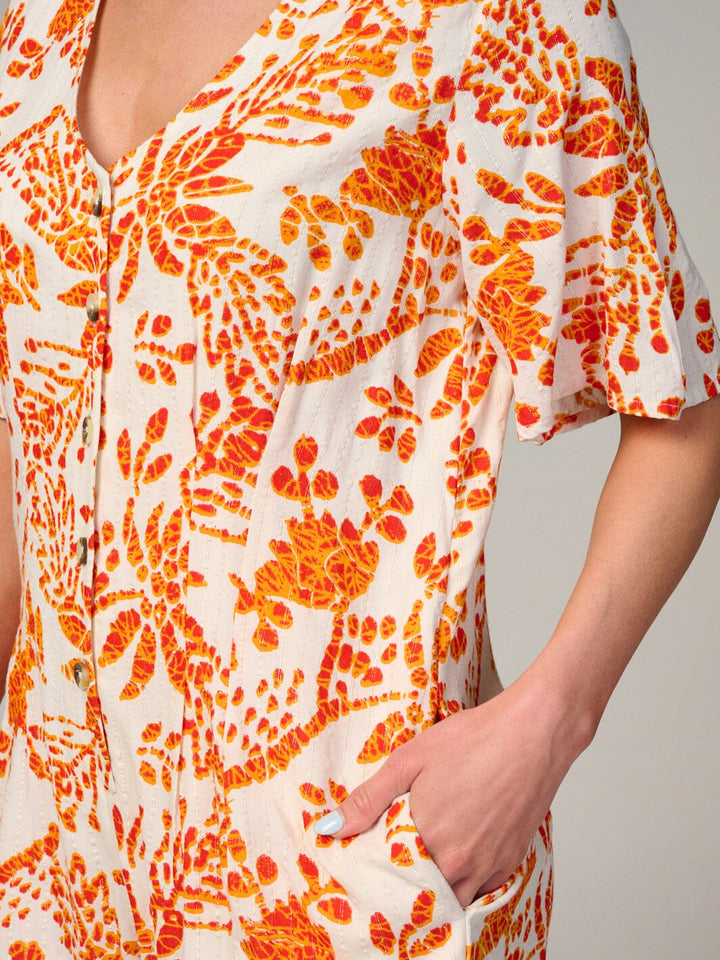WOMEN'S SHORT SLEEVE BUTTON UP FRONT POCKETS FLORAL ROMPER