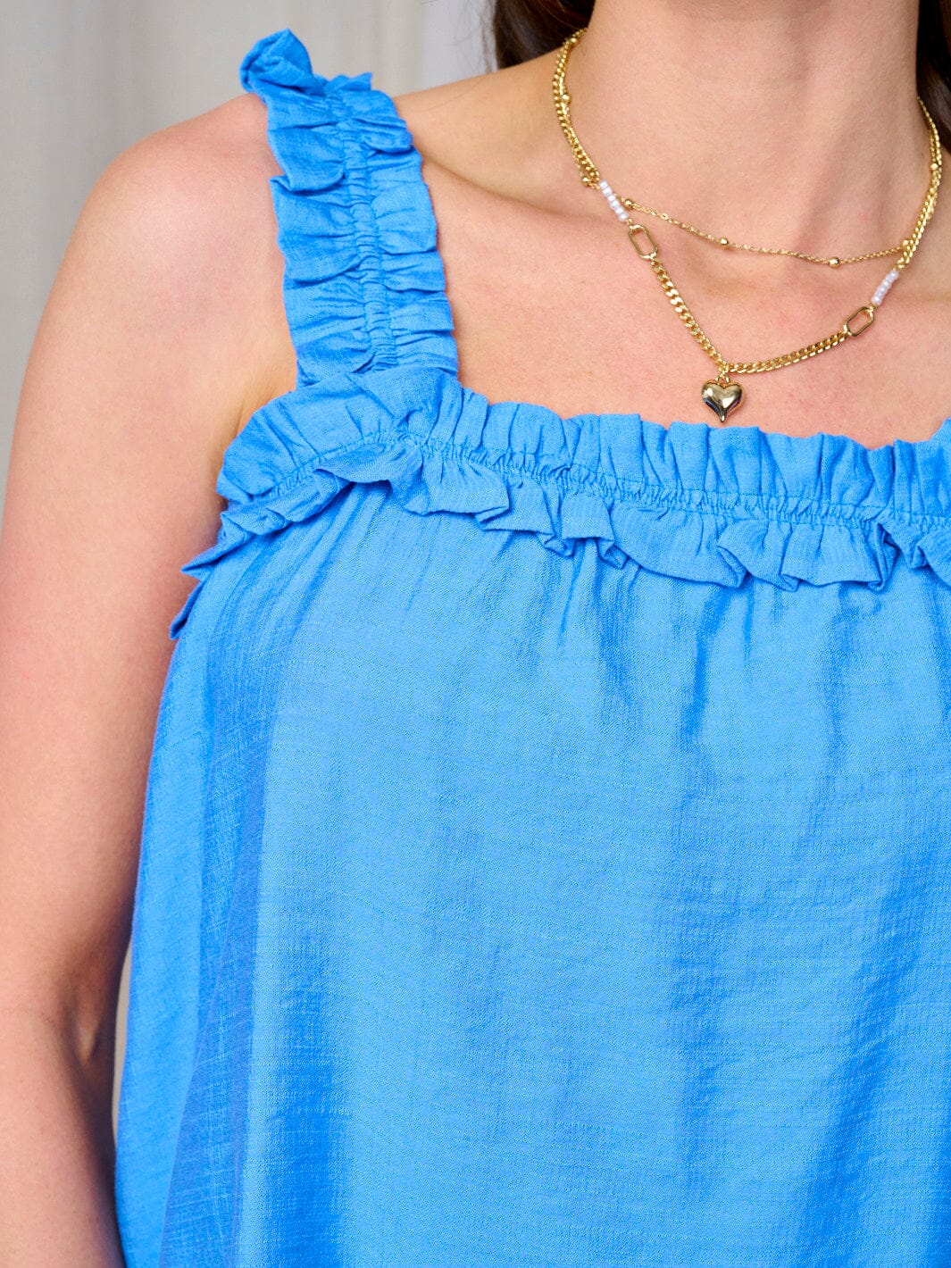 WOMEN'S SLEEVELESS RUFFLE ELSATIC TRIM TANK TOP