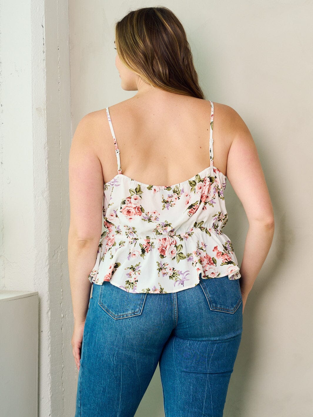 PLUS SIZE SLEEVELESS SURPLICE PLEPLUM FLORAL TANK TOP