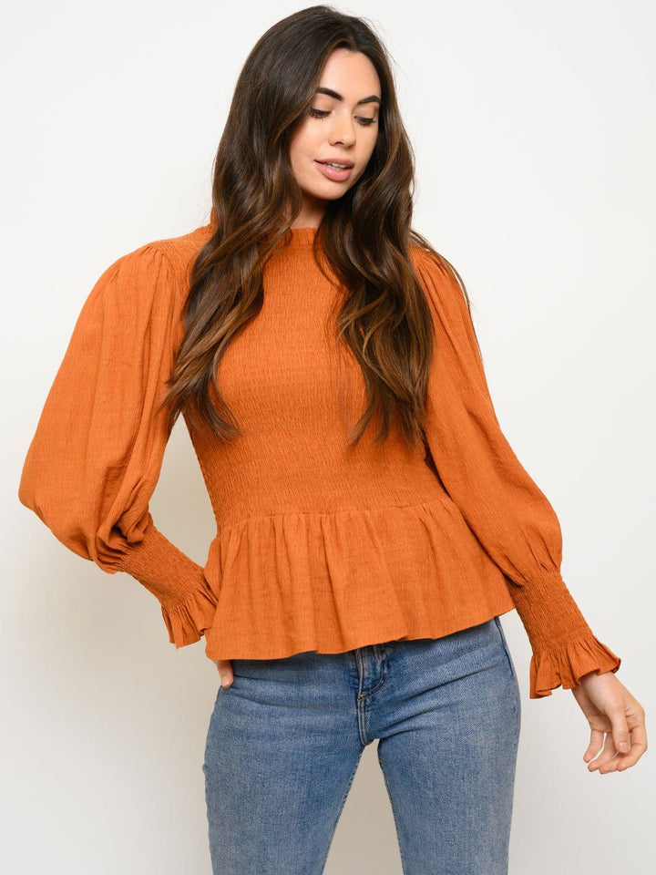 WOMEN'S WOVEN SOLID SMOCKED LONG SLEEVE PEPLUM TOP