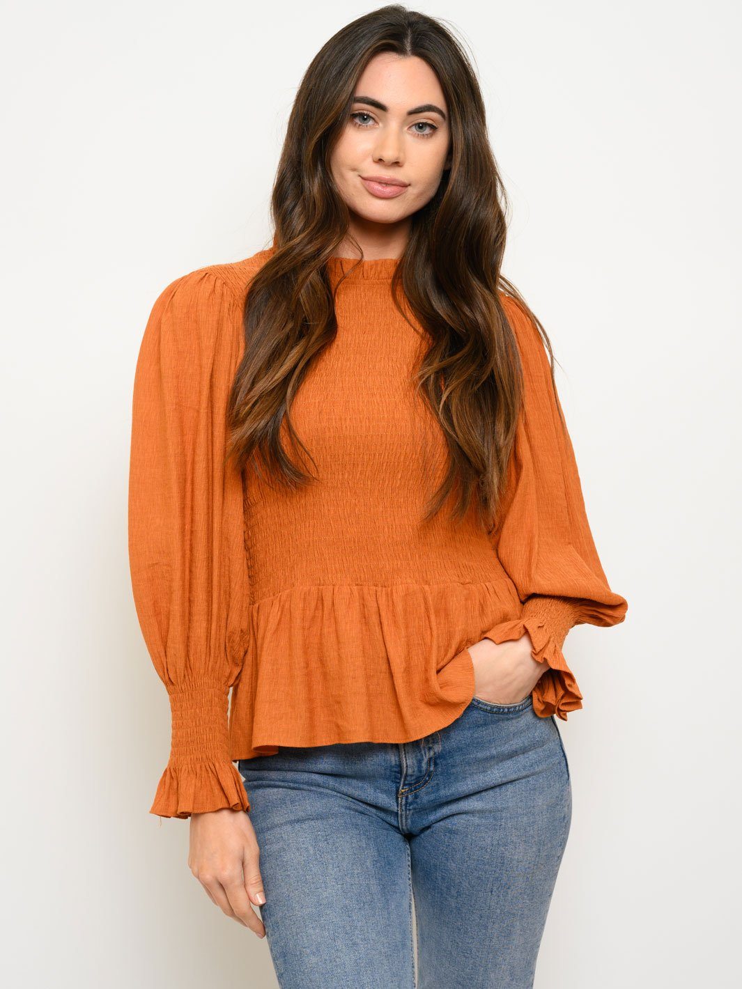 WOMEN'S WOVEN SOLID SMOCKED LONG SLEEVE PEPLUM TOP