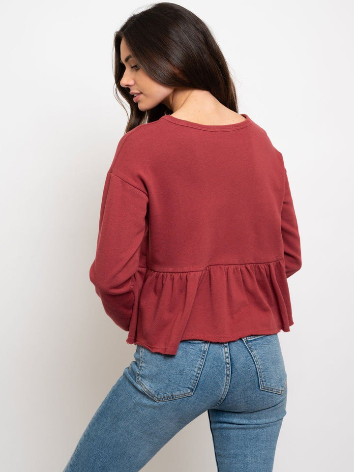 WOMEN'S RUFFLE BOTTON SWEATSHIRT