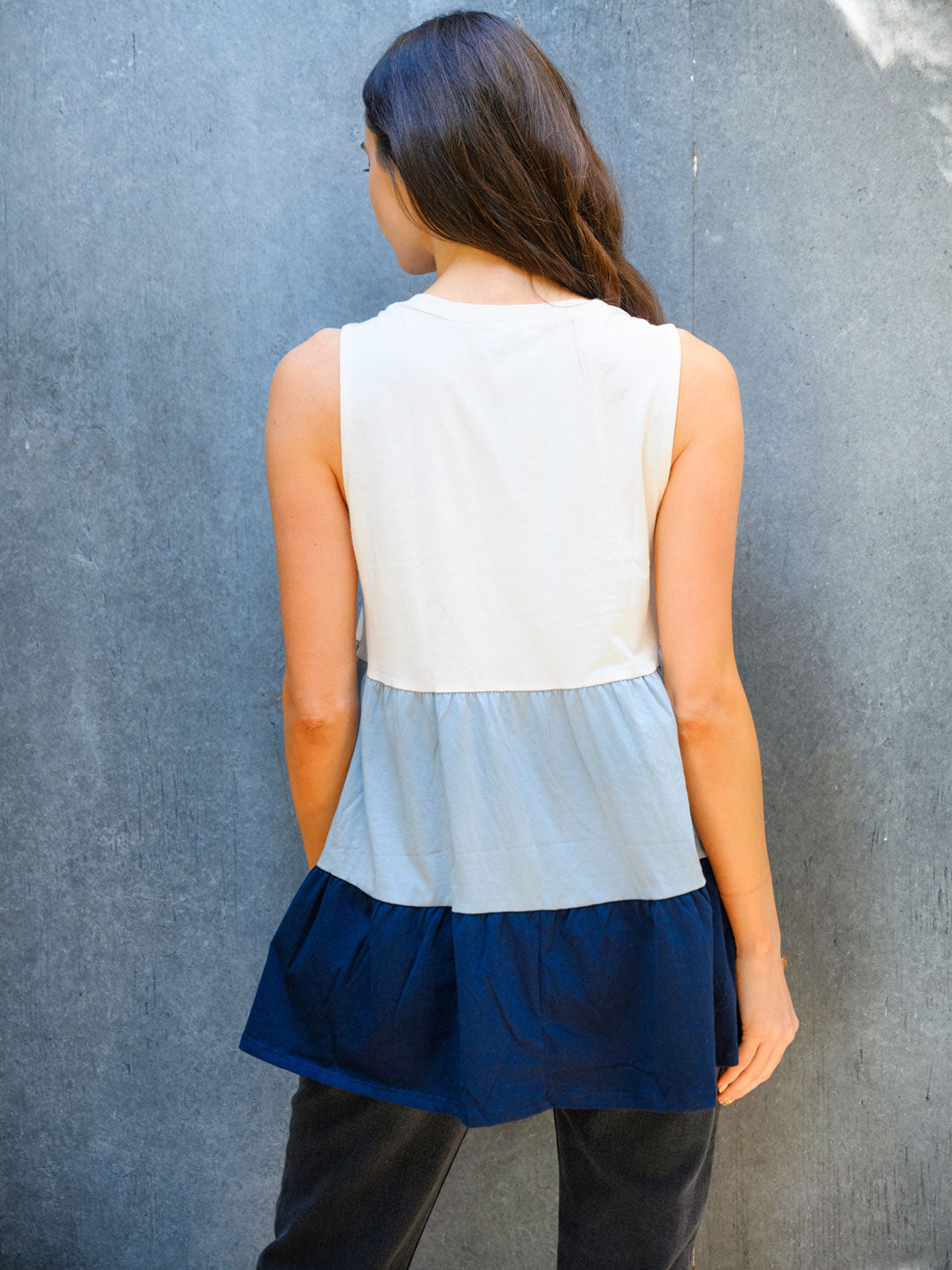 WOMEN'S SLEVELESS COLOR BLOCK TIERES RUFFLE KNIT TOP