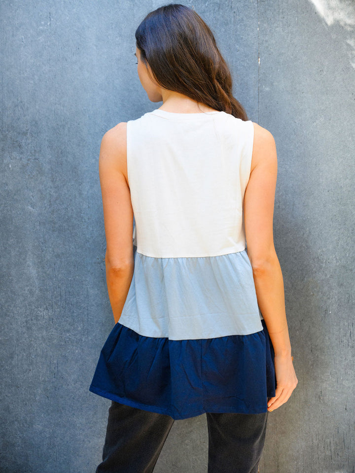 WOMEN'S SLEVELESS COLOR BLOCK TIERES RUFFLE KNIT TOP