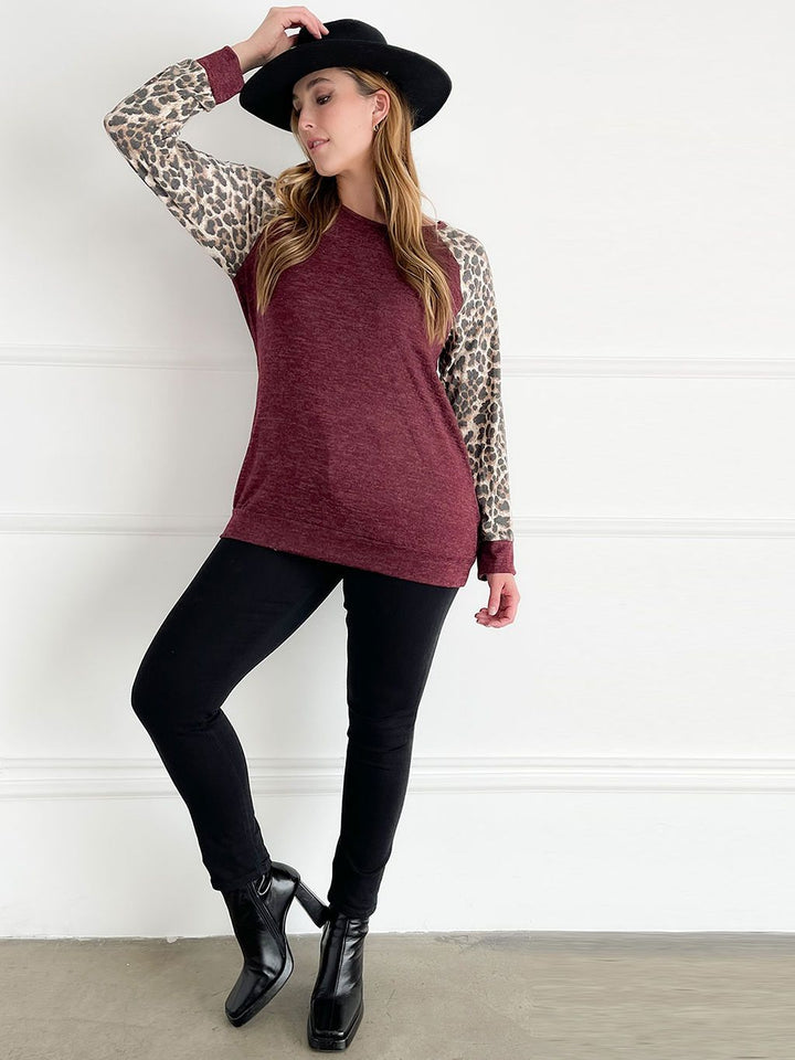 PLUS SIZE LONG SLEEVE ANIMAL PRINT SOLID TOP