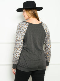 PLUS SIZE LONG SLEEVE ANIMAL PRINT SOLID TOP