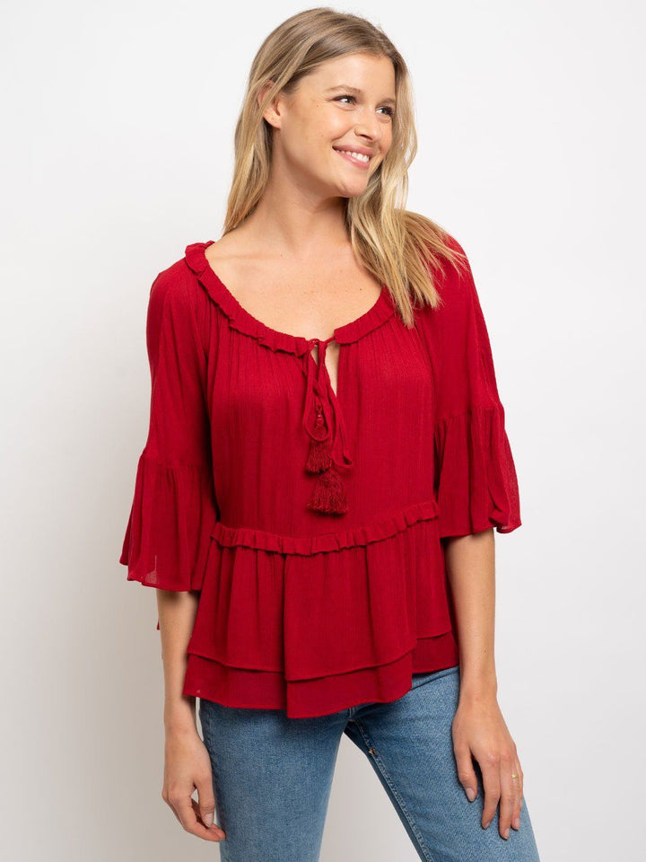 WOMEN'S RUFFLE TESSEL DETAIL TOP