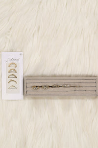 WOMEN'S ASSORTED SHAPES GOLD STEEL RINGS