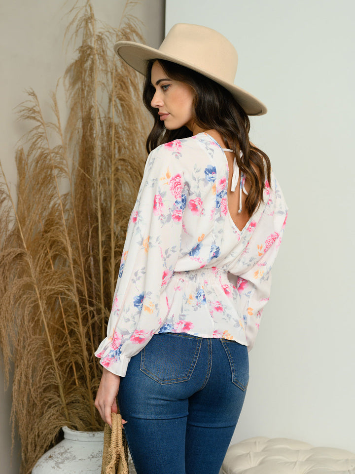 WOMEN'S SMOCKED PEPLUM FLORAL TOP