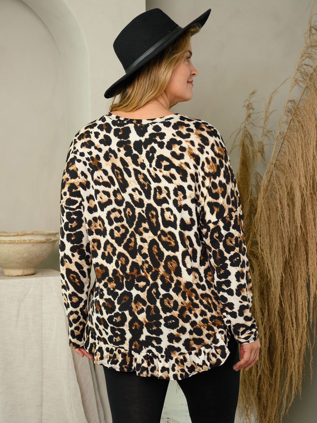 PLUS SIZE LONG SLEEVE ANIMAL PRINT RUFFLE HEM TOP