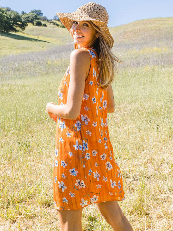 WOMEN'S SLEEVELESS FLORAL SHIMMER TUNIC MINI DRESS