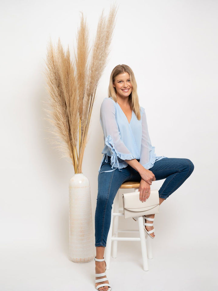 WOMEN'S WRAP LONG SLEEVE RUFFLE DETAIL TOP