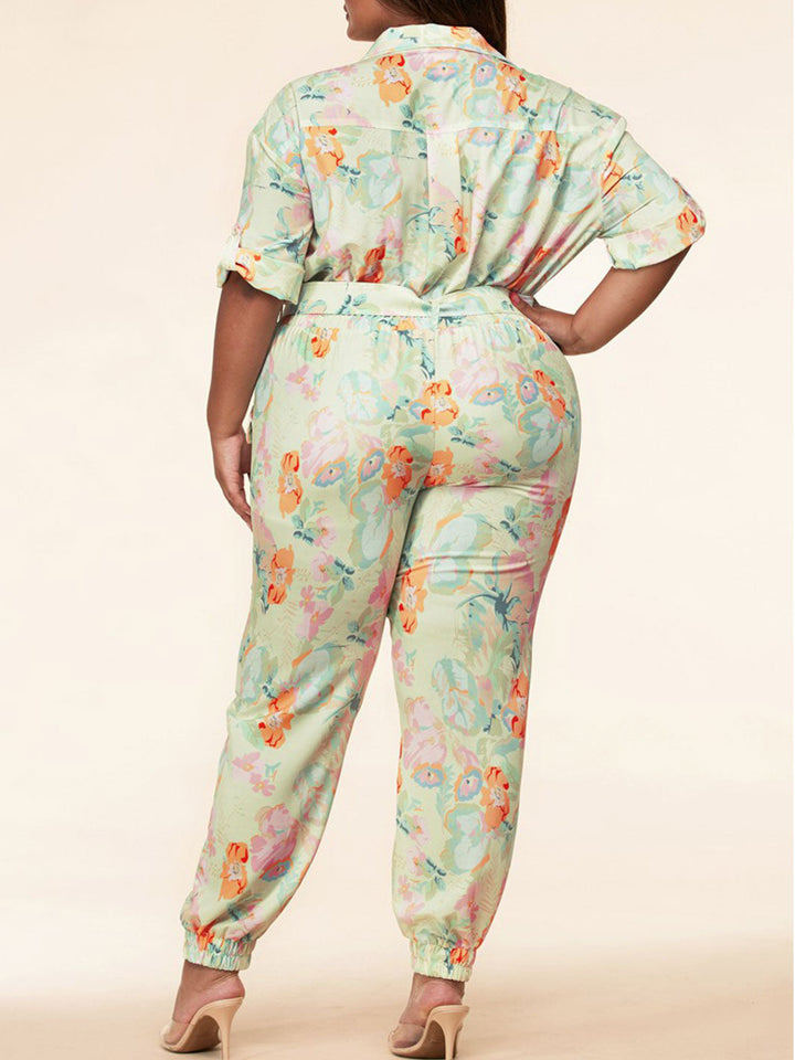 PLUS SIZE SHORT SLEEVE FLORAL BELT JUMPSUIT
