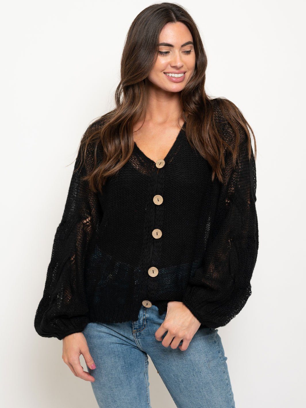 WOMEN'S OVERSIZED TWISTED KNIT SWEATER