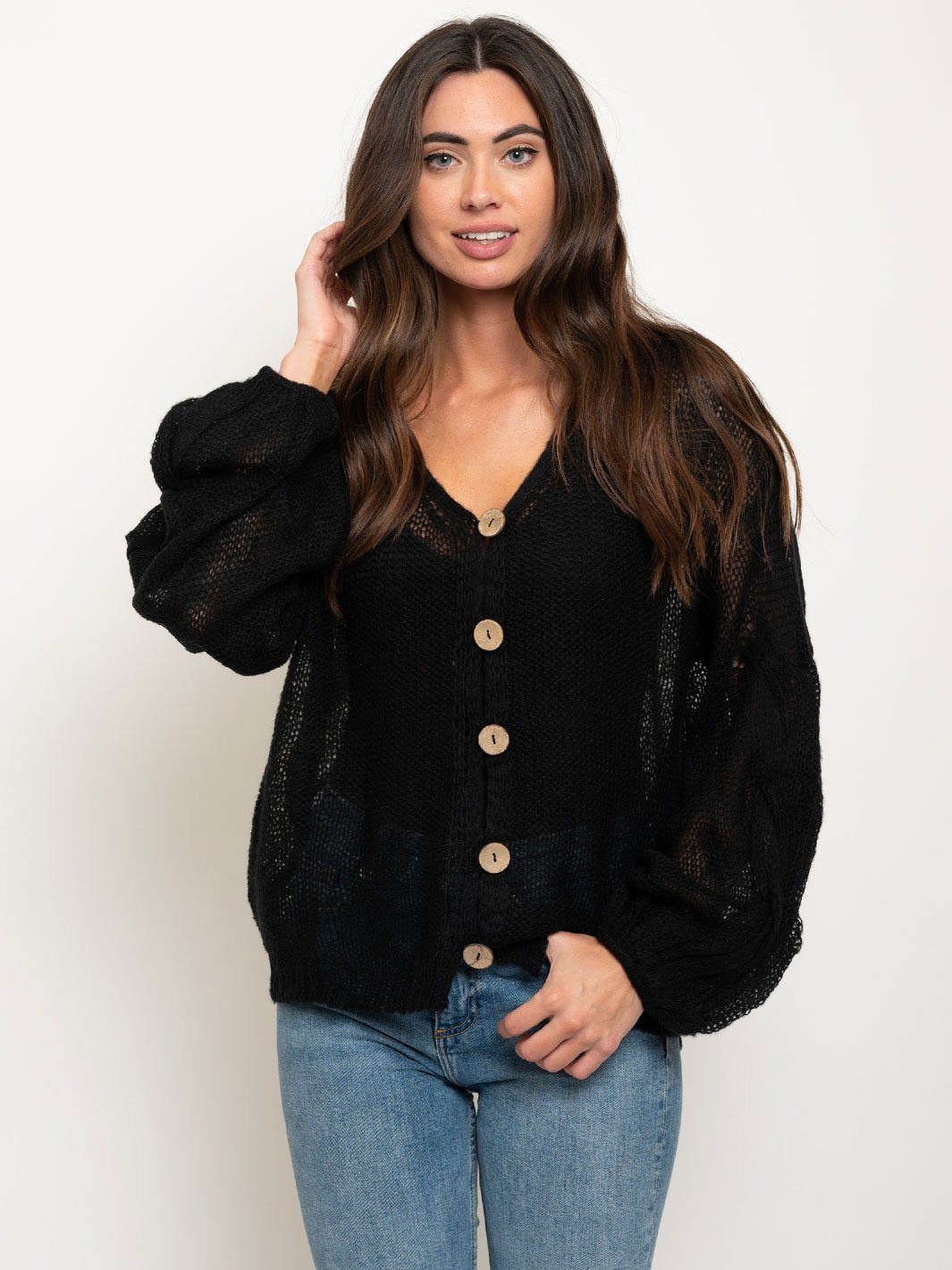 WOMEN'S OVERSIZED TWISTED KNIT SWEATER