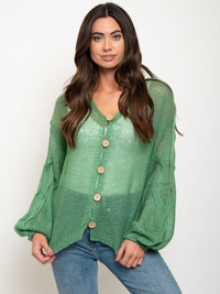 WOMEN'S OVERSIZED TWISTED KNIT SWEATER