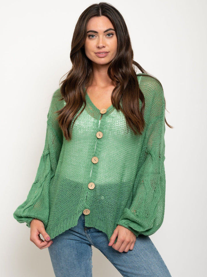 WOMEN'S OVERSIZED TWISTED KNIT SWEATER