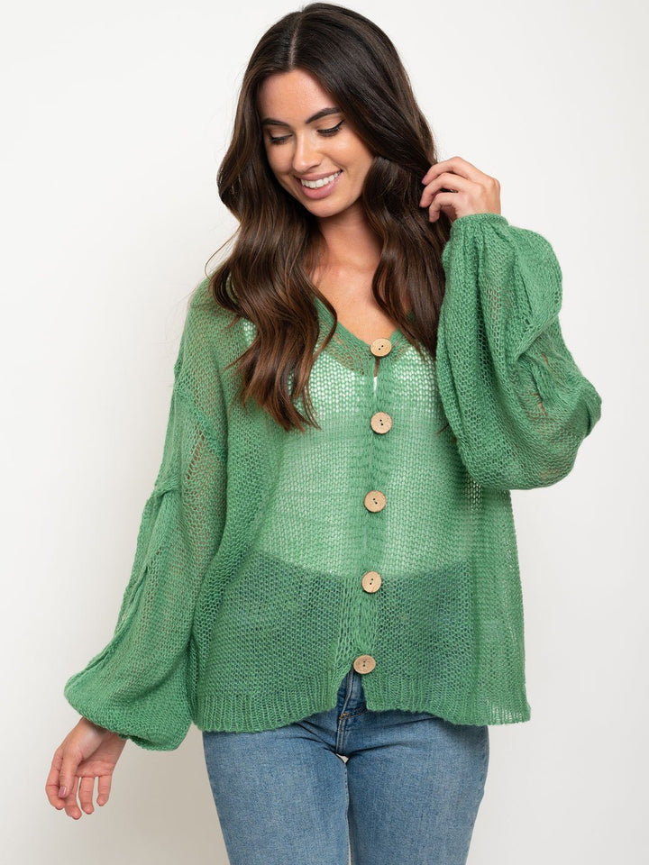 WOMEN'S OVERSIZED TWISTED KNIT SWEATER