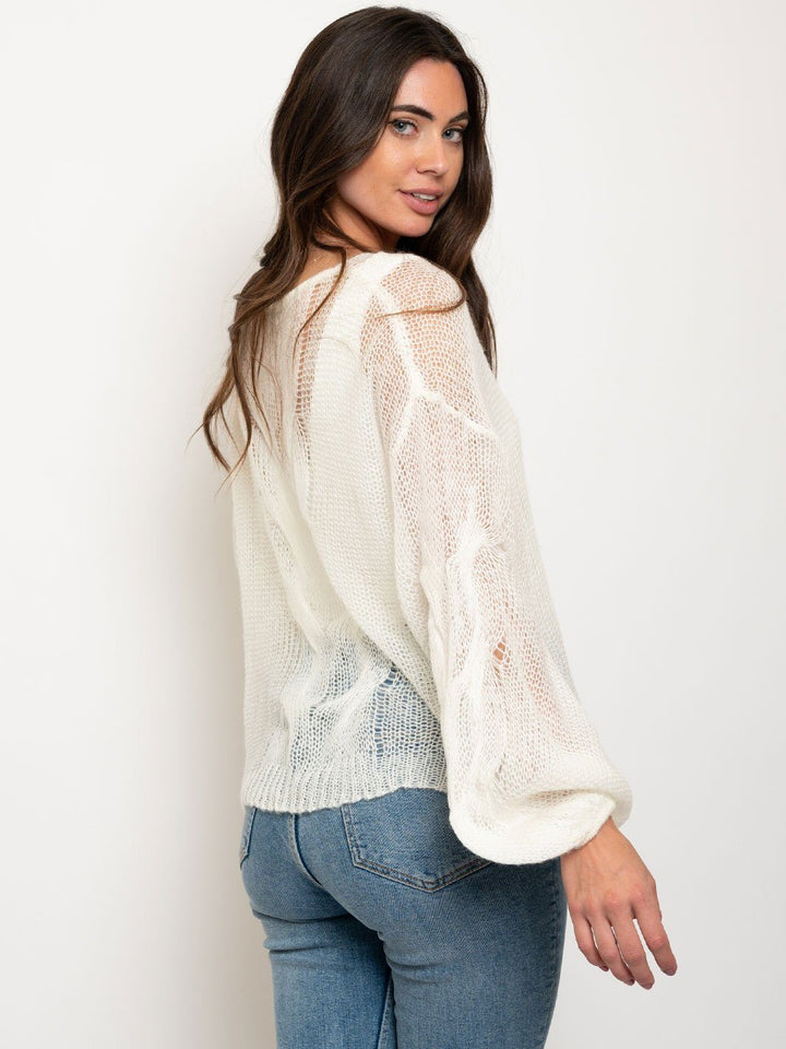 WOMEN'S OVERSIZED TWISTED KNIT SWEATER