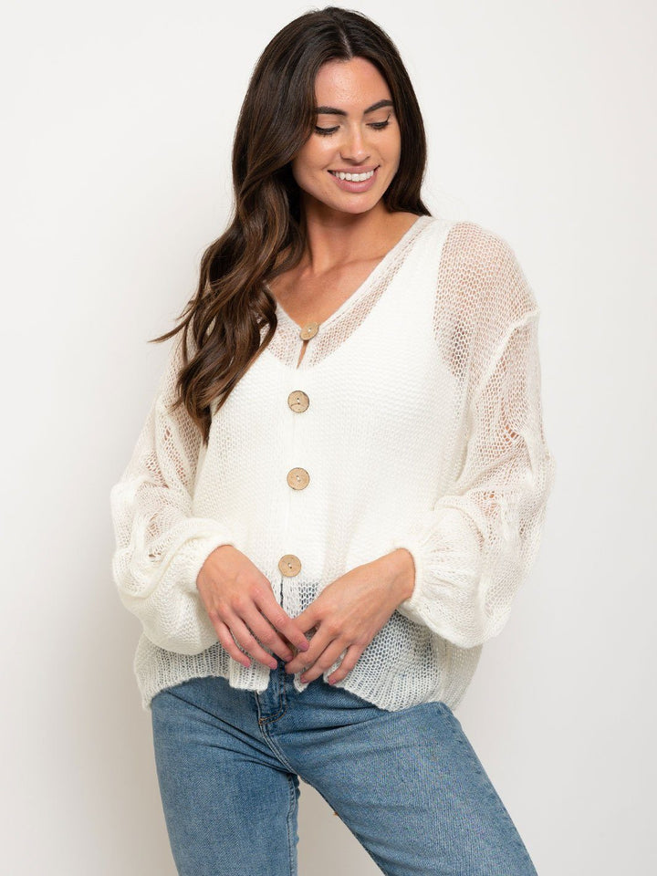 WOMEN'S OVERSIZED TWISTED KNIT SWEATER