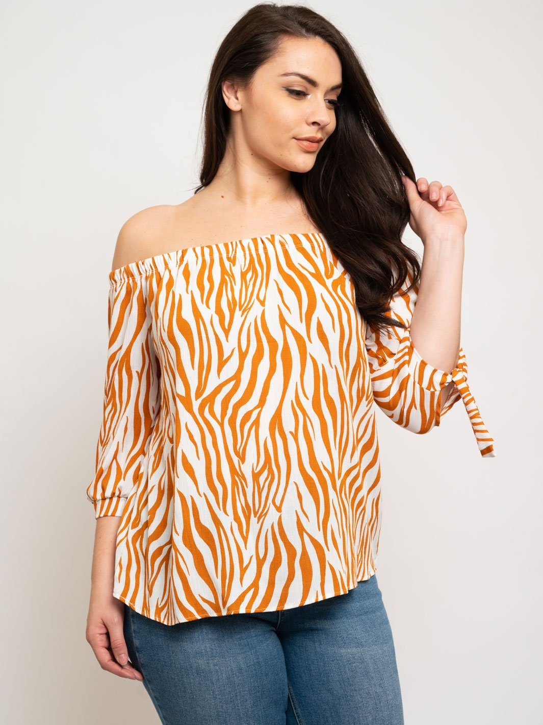 PLUS SIZE OFF THE SHOULDER TOP